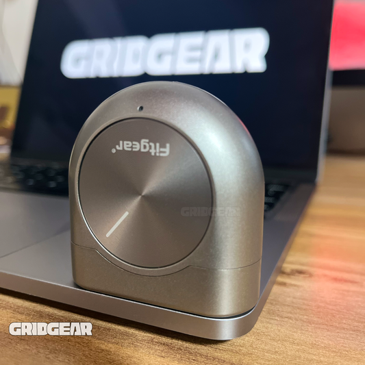 GridGear device on a wooden surface with a blurred background